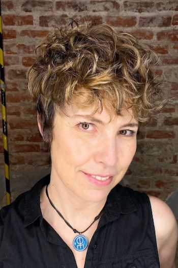 Curly textured pixie