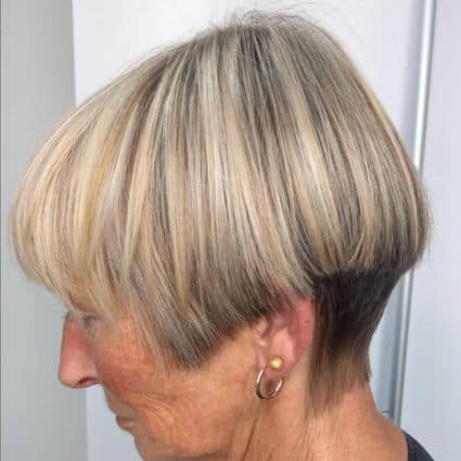 Blonde bowl cut with dark undertones