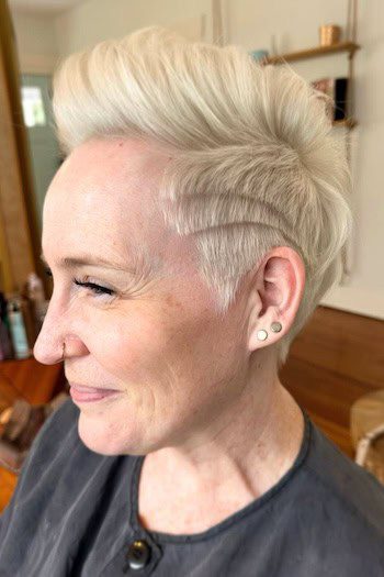 Short blonde pixie with volume and line design