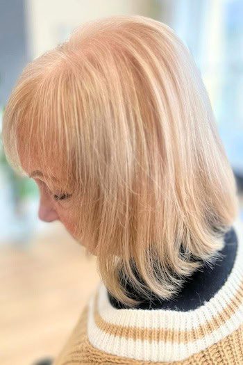 Long blonde bob with bangs