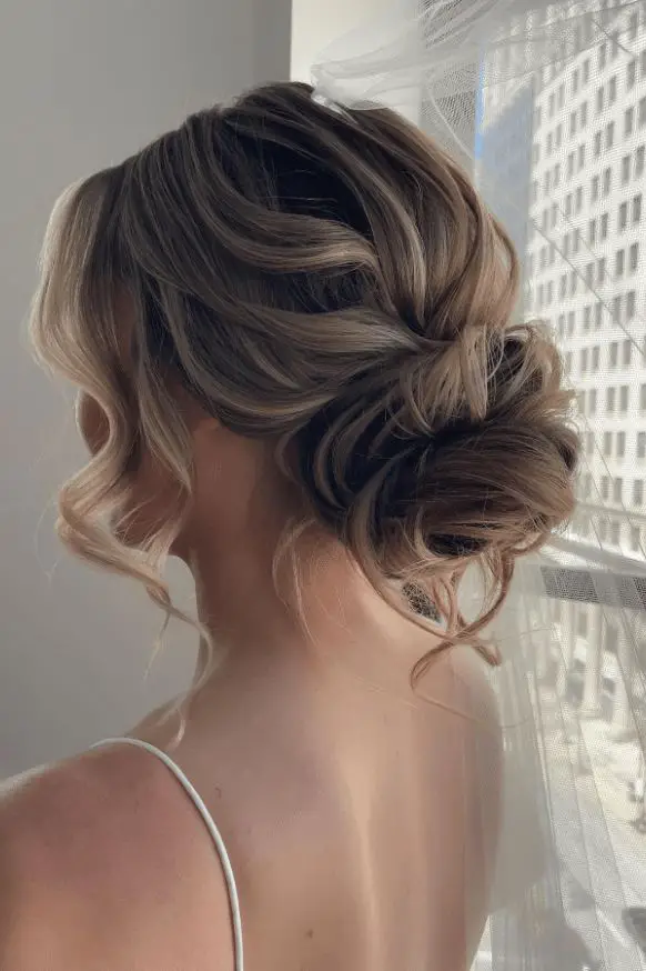 Messy Romantic Updo Wedding Hairstyle