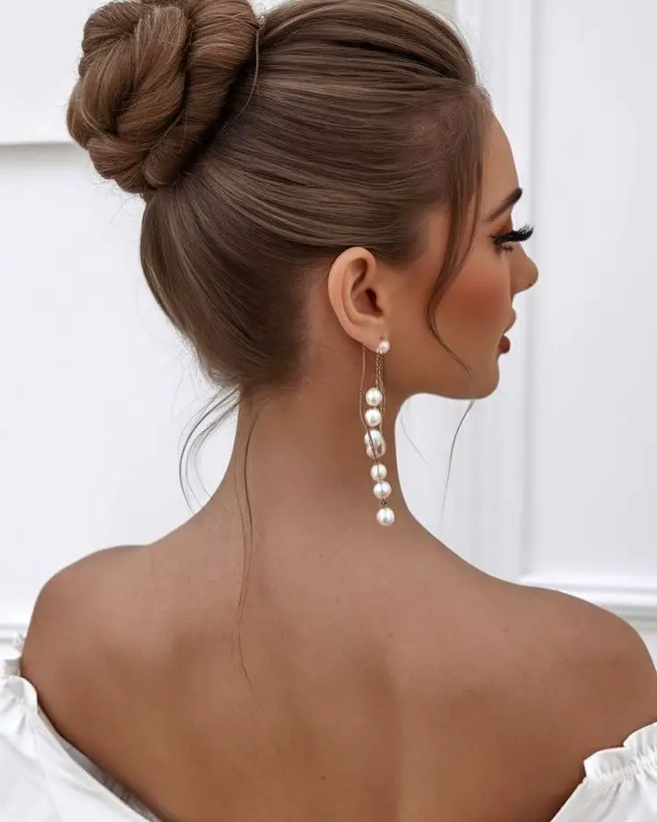 Sleek High Bun Wedding Hairstyle