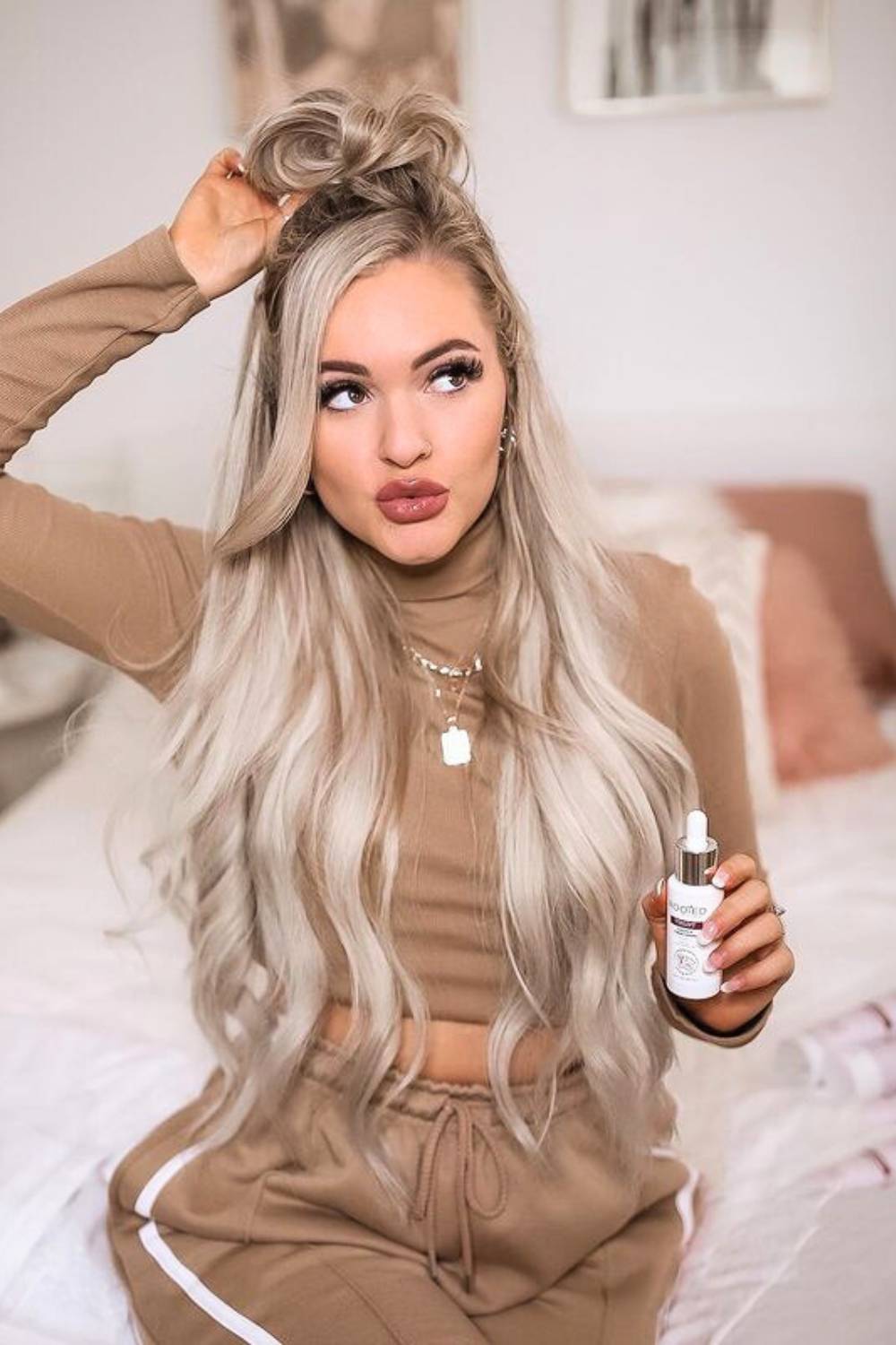 Half-up half-down hairstyle showcasing natural waves