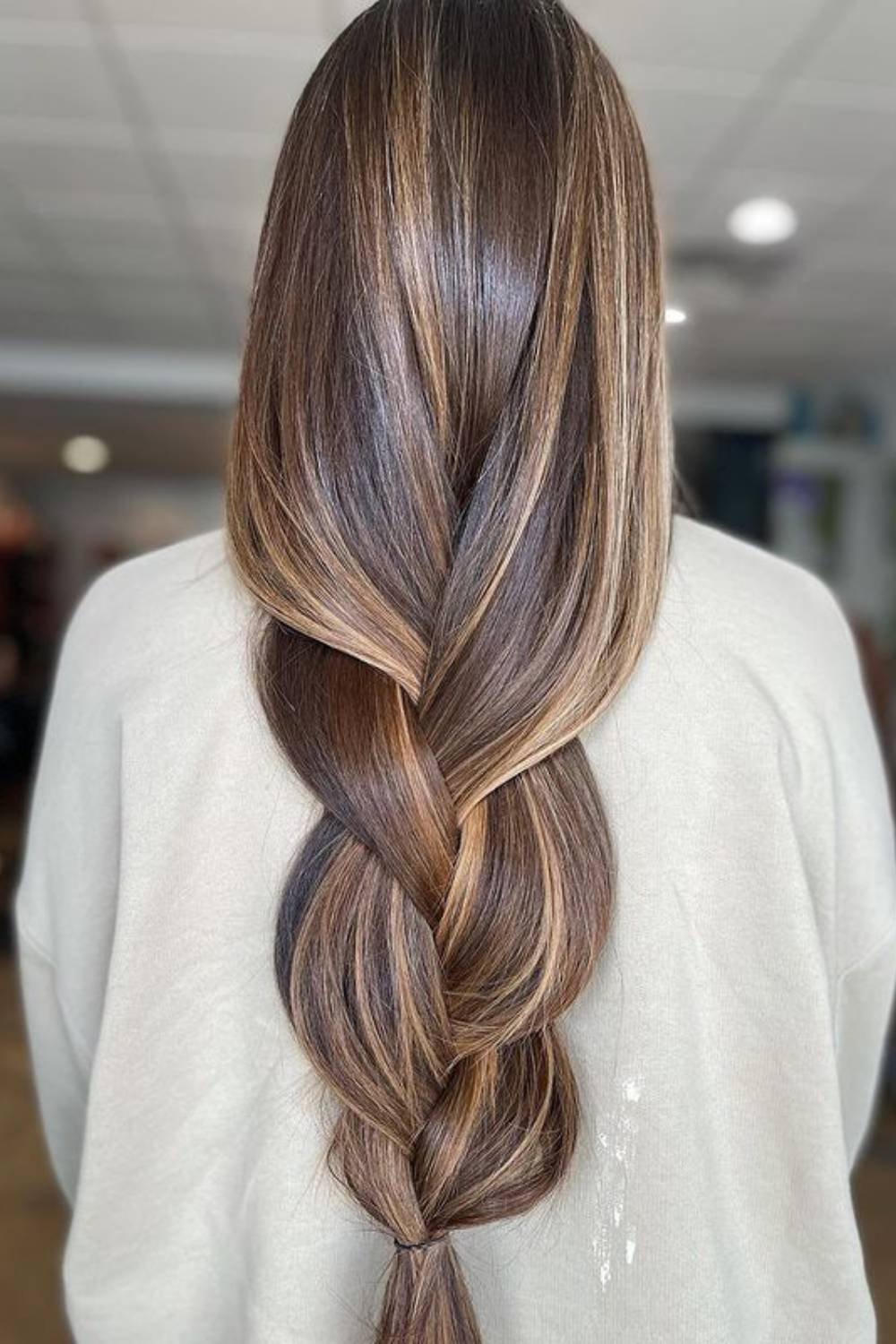 Flowing cascade braid with voluminous twisted pattern