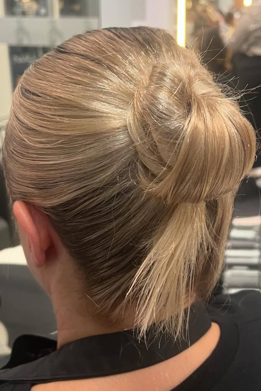 Sleek low bun hairstyle perfect for professional settings