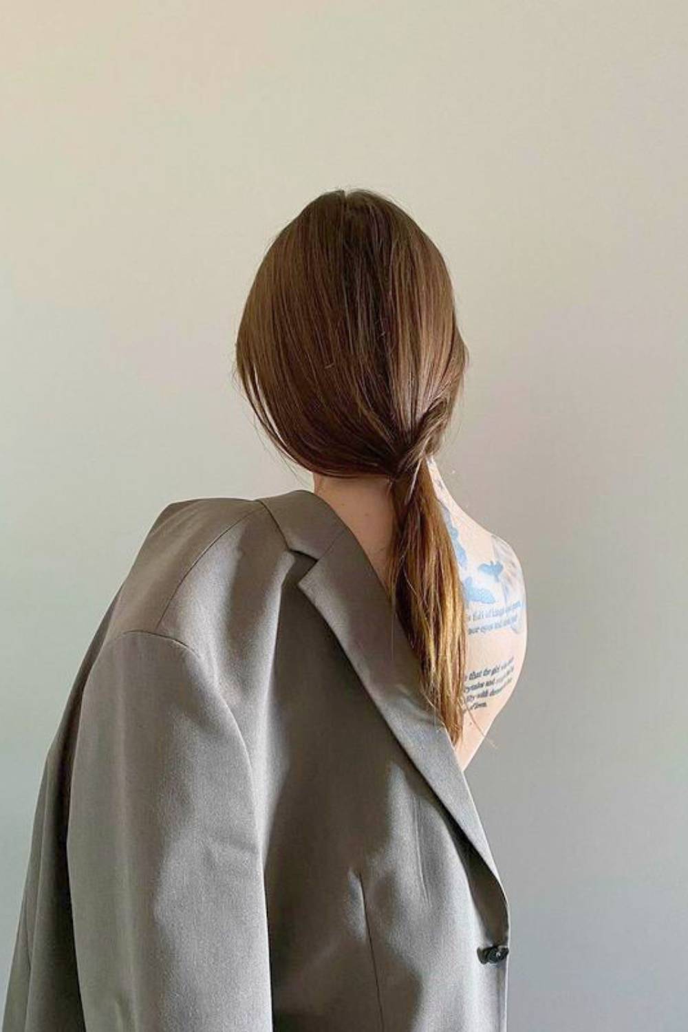 Simple low ponytail showcasing natural hair texture