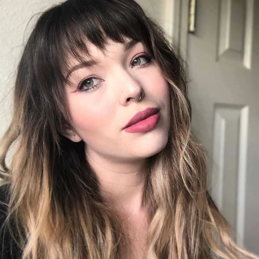 Layered Shag With Blonde Highlights and Bangs for Fine Hair