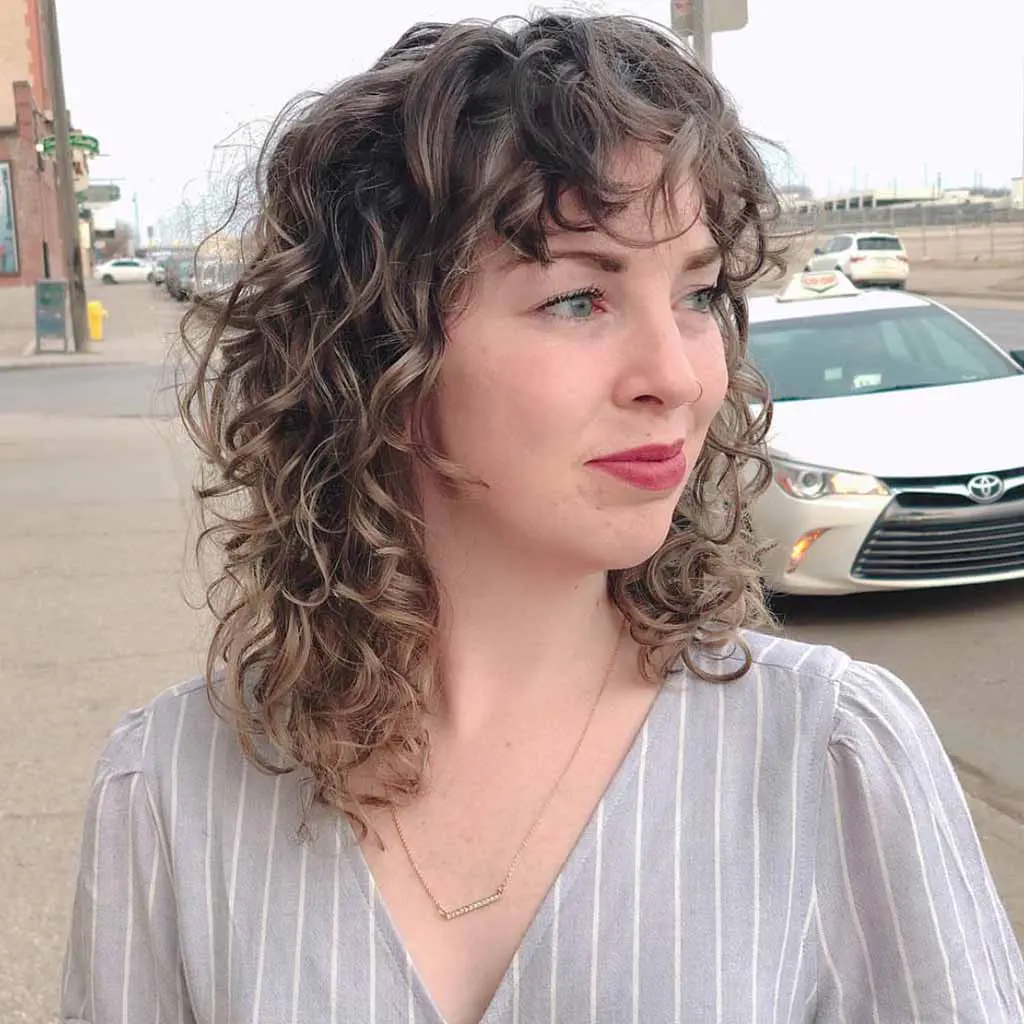 Curly Medium Shag With Curly Bangs for Fine Hair