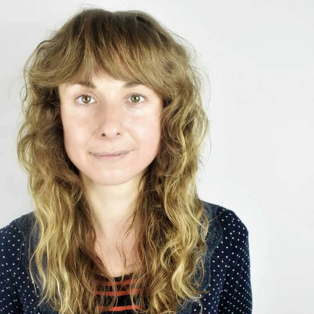 Short Curly Shag With Bangs for Fine Hair