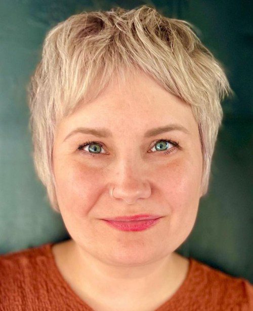 Pixie with curtain bangs for round face shapes