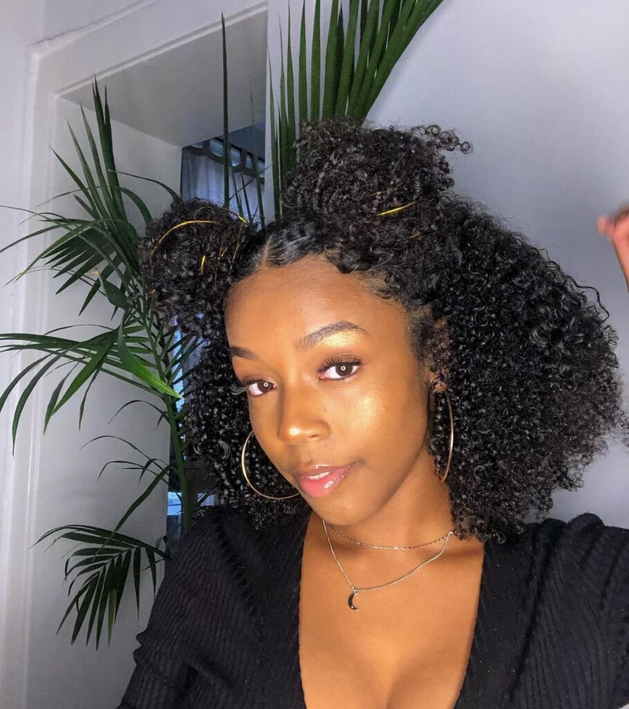 Two buns half up half down on natural hair