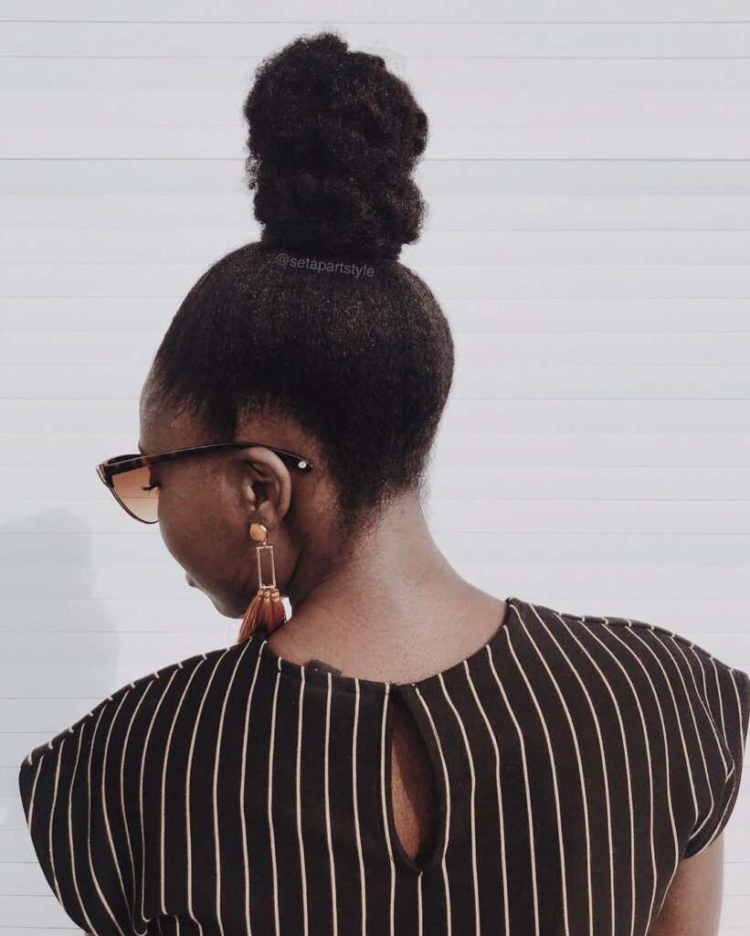 Detailed high bun on natural hair