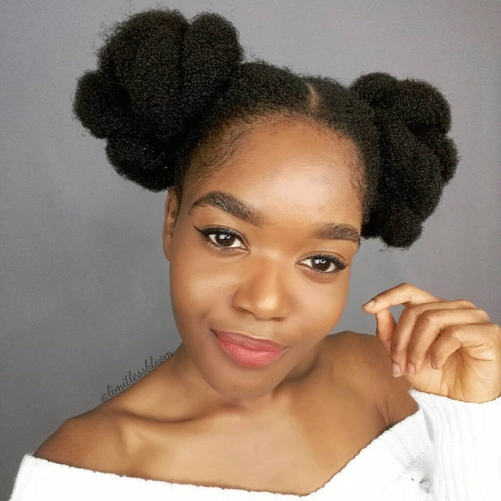 Detailed double buns on natural hair