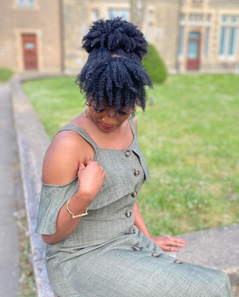 Curly bun with bangs on natural hair